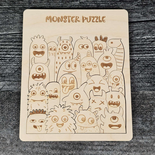 Wooden monster puzzle on a dark wooden surface