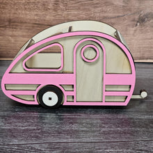 Load image into Gallery viewer, Wooden toy camper with pink outline on a wooden surface