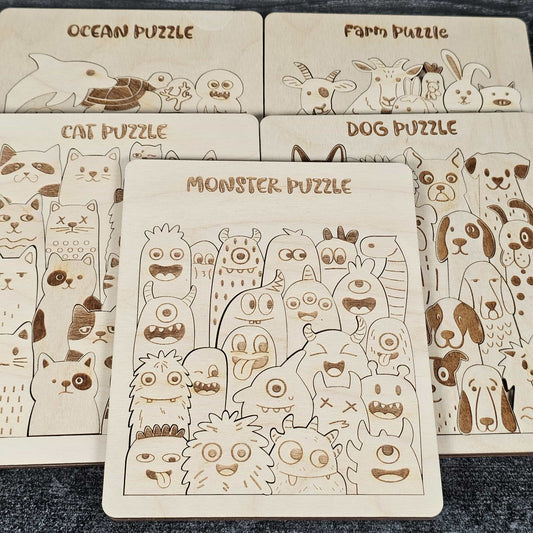Set of wooden puzzles with different animal themes on a dark surface.