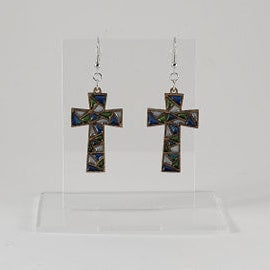 A pair of stained glass cross earrings with a blue and green design, displayed in a clear case.