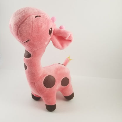 Pink plush toy giraffe on a white background